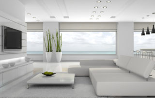 beautiful room with windows overlooking ocean