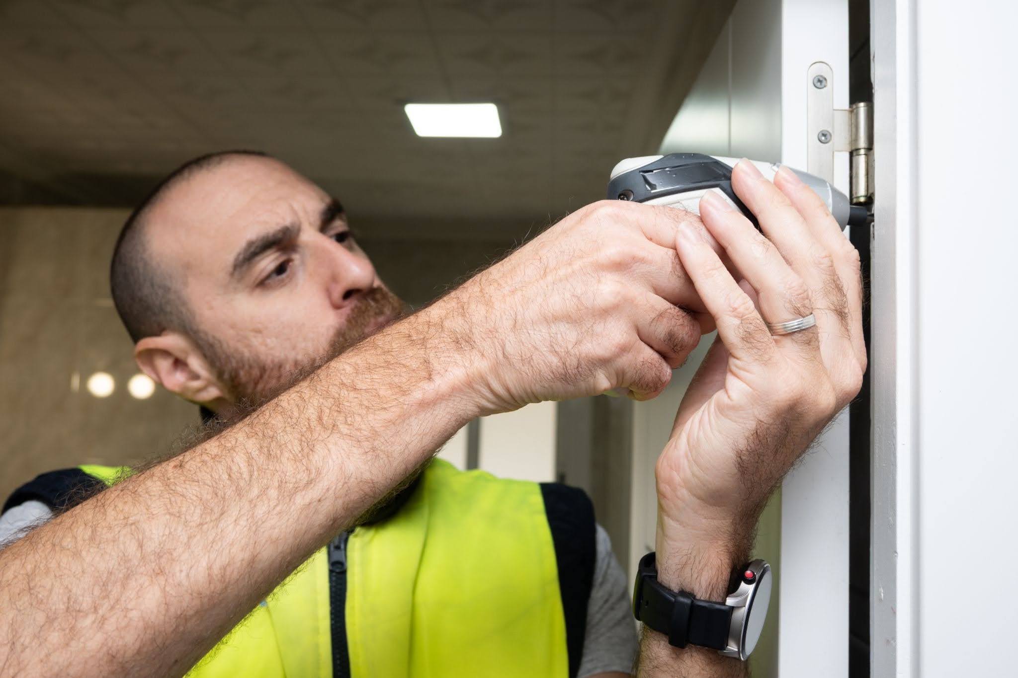 Professional installation of impact windows.